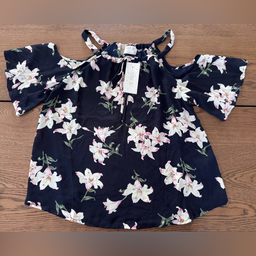 Flower top with off the shoulders.